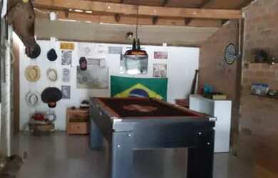 Imagem: A casa possui 3 Dormitórios, 3 Banheiros, 5 Vagas na garagem