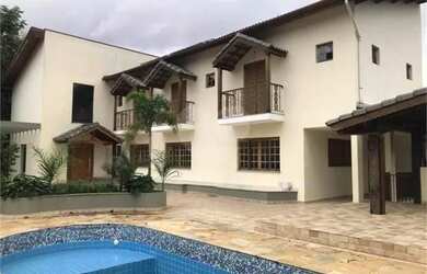 Imagem: A casa possui 3 Dormitórios, 5 Banheiros, 5 Vagas na garagem