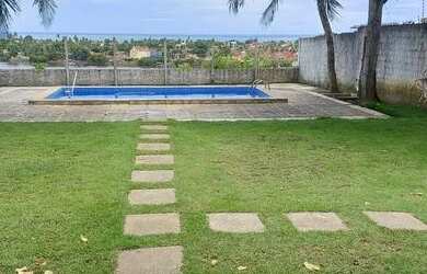 Imagem: A casa possui 2 Dormitórios, 2 Banheiros, 3 Vagas na garagem