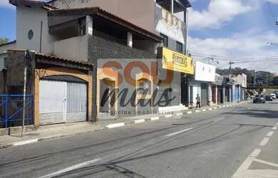 Imagem: A casa possui 5 Dormitórios, 3 Banheiros, 2 Vagas na garagem