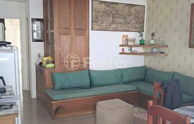 Imagem: O apartamento possui 1 Dormitório, 1 Banheiro, 1 Vaga na garagem