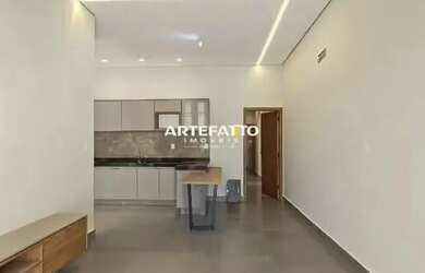 Imagem: A casa possui 3 Dormitórios, 2 Banheiros, 2 Vagas na garagem