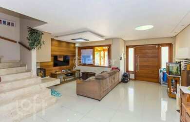 Imagem: A casa à venda possui 3 Dormitórios, 2 Banheiros, 2 Vagas