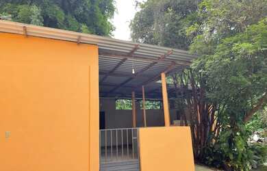 Imagem: A casa possui 2 Dormitórios, 3 Banheiros, 1 Vaga na garagem