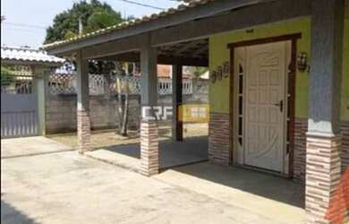 Imagem: A casa possui 4 Dormitórios, 2 Banheiros, 4 Vagas na garagem