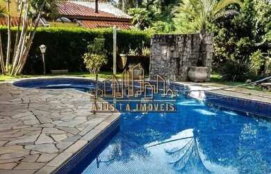 Imagem: A casa possui 5 Dormitórios, 5 Banheiros, 4 Vagas na garagem