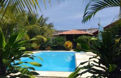 Imagem: A casa possui 4 Dormitórios, 5 Vagas na garagem e está localizado