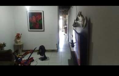 Imagem: A casa possui 2 Dormitórios, 1 Banheiro, 1 Vaga na garagem