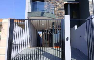 Imagem: A casa possui 3 Dormitórios, 3 Banheiros, 1 Vaga na garagem