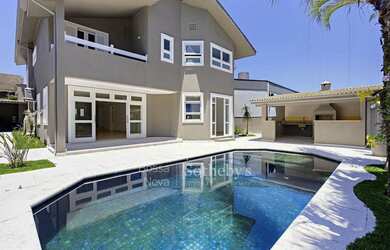 Imagem: A casa em condomínio possui 4 Dormitórios, 5 Banheiros, 5