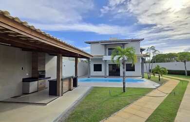 Imagem: A casa possui 4 Dormitórios, 5 Banheiros, 5 Vagas na garagem