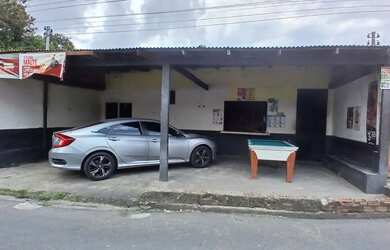 Imagem: A casa possui 5 Dormitórios, 5 Banheiros, 2 Vagas na garagem