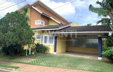 Imagem: A casa em condomínio possui 5 Dormitórios, 5 Banheiros, 2