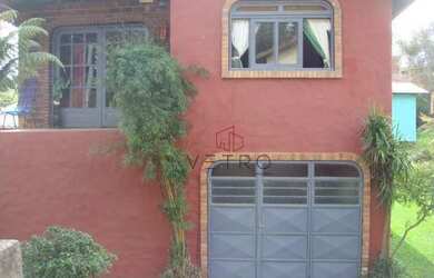 Imagem: A casa possui 2 Dormitórios, 2 Banheiros, 2 Vagas na garagem