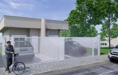 Imagem: A casa possui 2 Dormitórios, 3 Banheiros, 2 Vagas na garagem