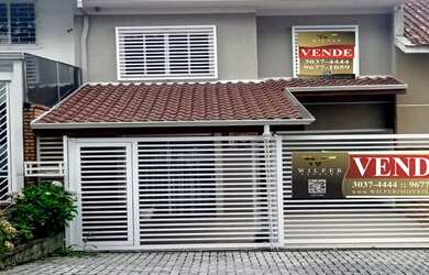 Imagem: A casa possui 3 Dormitórios, 4 Banheiros, 3 Vagas na garagem