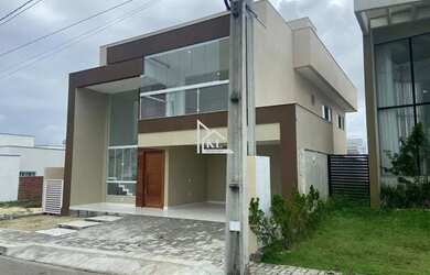 Imagem: A casa possui 5 Dormitórios, 5 Banheiros, 4 Vagas na garagem