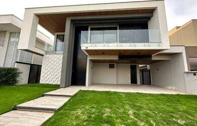 Imagem: A casa em condomínio possui 4 Dormitórios, 5 Banheiros, 5