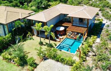 Imagem: A casa possui 5 Dormitórios, 5 Banheiros, 3 Vagas na garagem