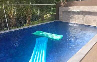 Imagem: A casa em condomínio à venda possui 5 Dormitórios, 5 Banheiros