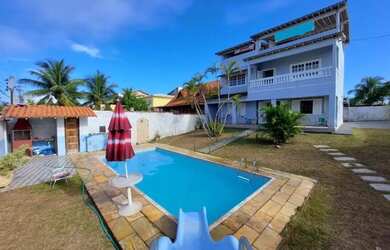 Imagem: A casa possui 5 Dormitórios, 5 Banheiros, 5 Vagas na garagem