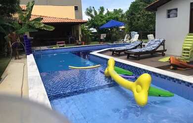 Imagem: A casa em condomínio possui 5 Dormitórios, 5 Banheiros, 2