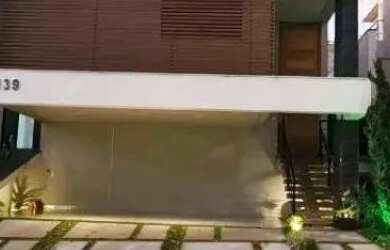 Imagem: A casa em condomínio possui 4 Dormitórios, 4 Banheiros, 3