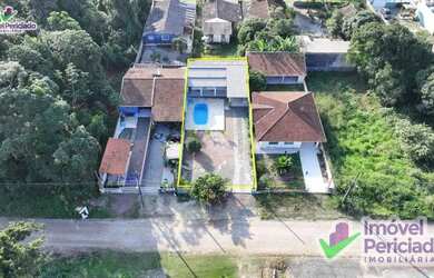 Imagem: A casa possui 2 Dormitórios, 2 Banheiros, 3 Vagas na garagem