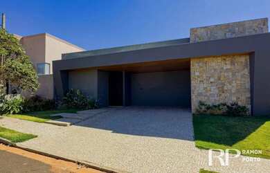 Imagem: A casa possui 3 Dormitórios, 4 Banheiros, 2 Vagas na garagem