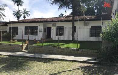 Imagem: A casa possui 3 Dormitórios, 3 Banheiros, 3 Vagas na garagem