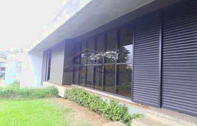 Imagem: A casa em condomínio possui 4 Dormitórios, 4 Banheiros, 4