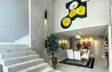 Imagem: A casa possui 4 Dormitórios, 4 Banheiros, 5 Vagas na garagem