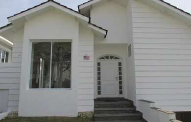 Imagem: A casa em condomínio possui 4 Dormitórios, 4 Banheiros, 4