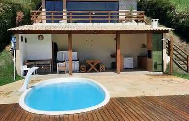 Imagem: A casa possui 2 Dormitórios e 3 Banheiros e está localizado