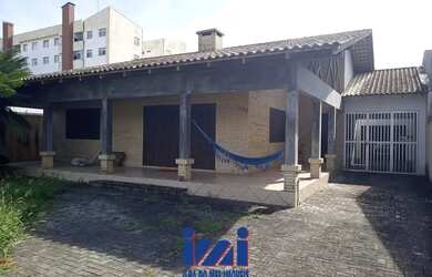 Imagem: A casa possui 5 Dormitórios, 4 Banheiros, 5 Vagas na garagem