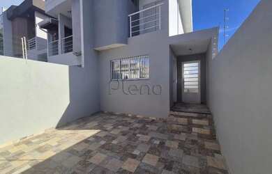 Imagem: A casa possui 3 Dormitórios, 1 Banheiro, 2 Vagas na garagem