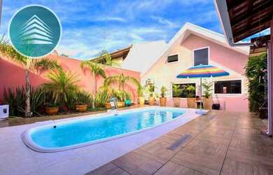 Imagem: A casa possui 3 Dormitórios, 5 Banheiros, 4 Vagas na garagem