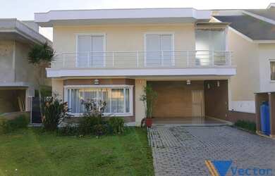 Imagem: A casa em condomínio possui 4 Dormitórios, 5 Banheiros, 4