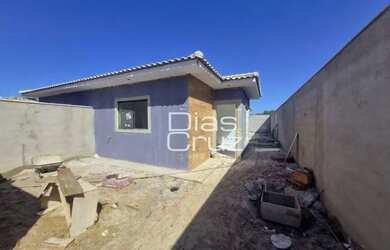 Imagem: A casa possui 3 Dormitórios, 2 Banheiros, 3 Vagas na garagem