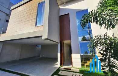 Imagem: A casa possui 4 Dormitórios, 5 Banheiros, 4 Vagas na garagem