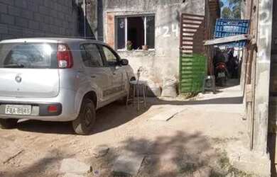 Imagem: A casa possui 2 Dormitórios, 1 Banheiro, 1 Vaga na garagem