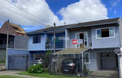 Imagem: A casa possui 3 Dormitórios, 4 Banheiros, 3 Vagas na garagem