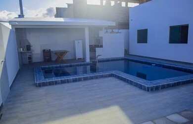 Imagem: A casa possui 4 Dormitórios, 4 Banheiros, 3 Vagas na garagem