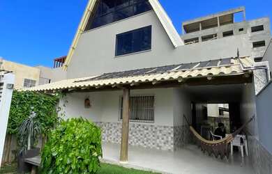 Imagem: A casa possui 2 Dormitórios, Acomodam 5 pessoas, 1 Vaga na