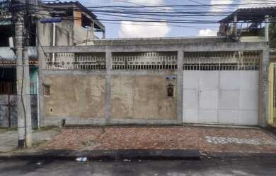 Imagem: A casa possui 3 Dormitórios, 4 Banheiros, 5 Vagas na garagem