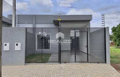 Imagem: A casa possui 2 Dormitórios, 1 Banheiro, 2 Vagas na garagem