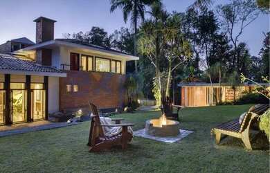 Imagem: A casa possui 5 Dormitórios, 5 Banheiros, 5 Vagas na garagem