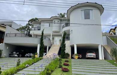 Imagem: A casa em condomínio possui 5 Dormitórios, 5 Banheiros, 5