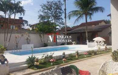 Imagem: A casa possui 3 Dormitórios, 3 Banheiros, 3 Vagas na garagem