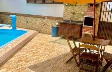 Imagem: A casa possui 2 Dormitórios, 1 Vaga na garagem e está localizado